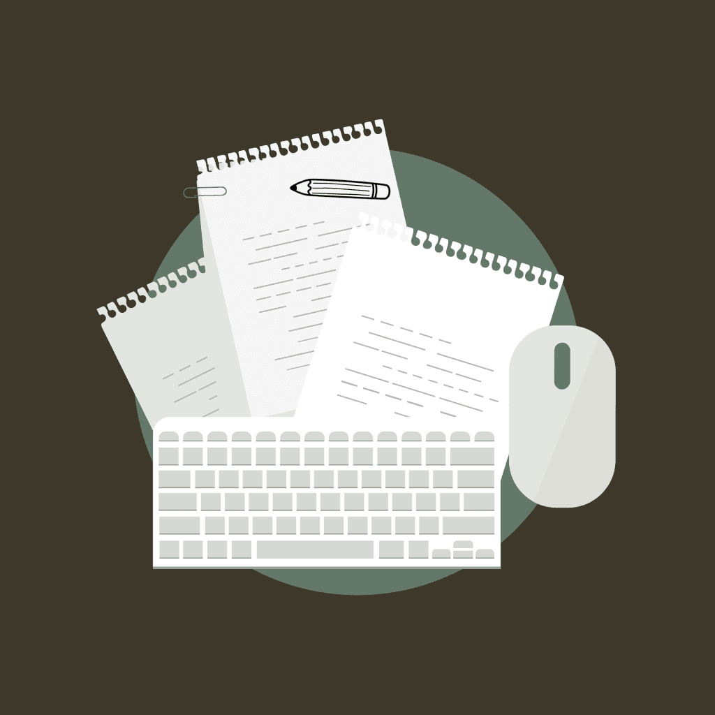 clavier ordinateur papier crayon et souris posés sur un bureau